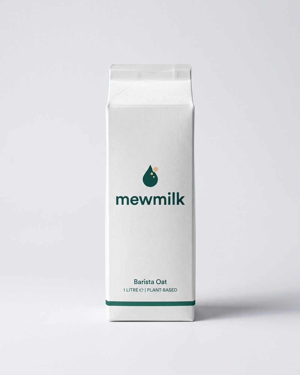 1L Barista Oat carton, studio shot with a soft long shadow on a milk-white surface