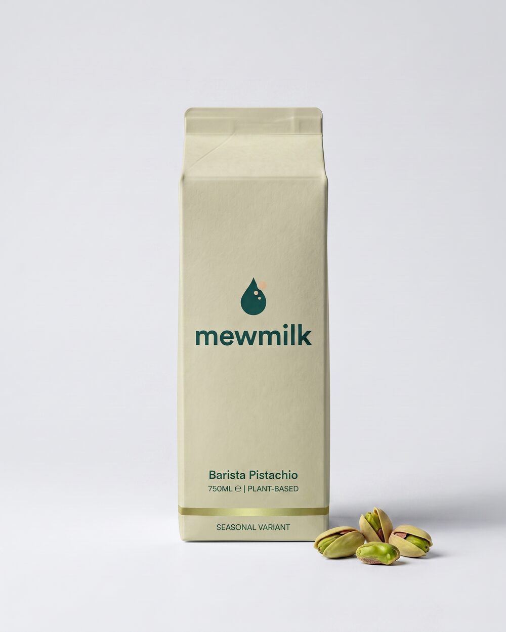 750ml Barista Pistachio carton with pistachios alongside, green-gold hue
